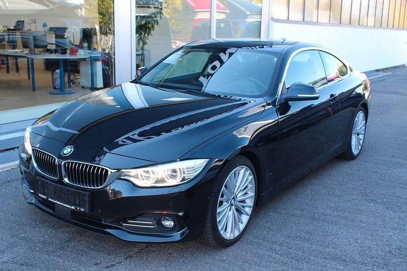 Schwarz Gebraucht 2015 BMW 430 Comfort Edition Coupé | 8.950 € (Superpreis) - Bild 1/4
