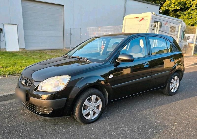 Second-hand Kia Rio 97 CP (71 kW) 2009 Negru Berlinǎ