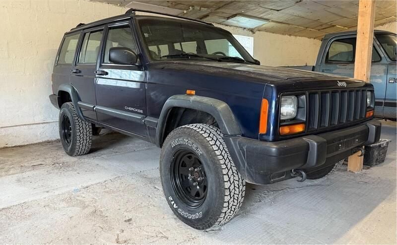 Blau Gebraucht 1998 Jeep Cherokee Sport SUV | 8.490 € (Fairer Preis) - Bild 1/3