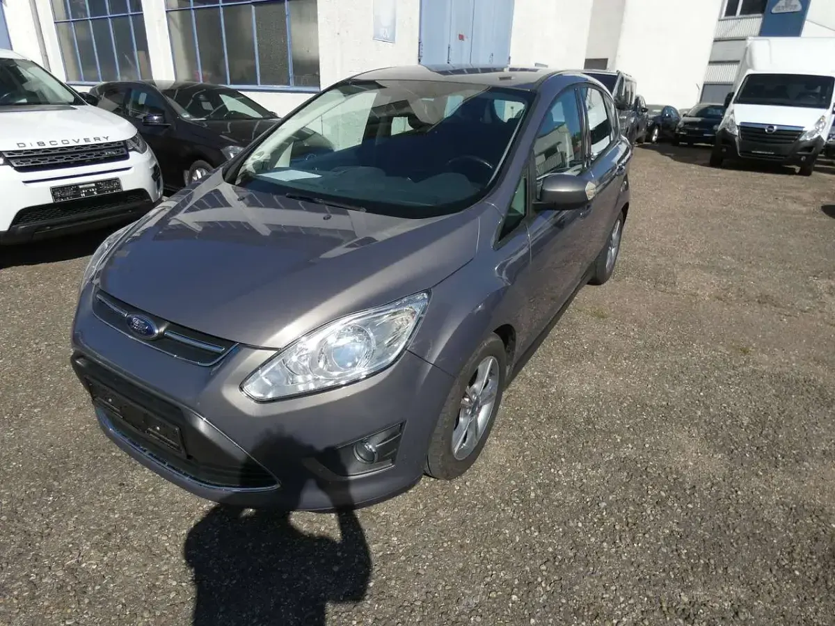 Gebraucht Ford C-MAX SYNC Edition 125 PS (91 kW) 2015 Brisbane braun (met.) Van / Kleinbus
