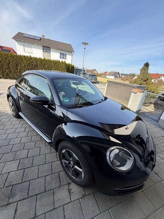 Gebraucht VW Beetle 105 PS (77 kW) 2011 Schwarz Kleinwagen