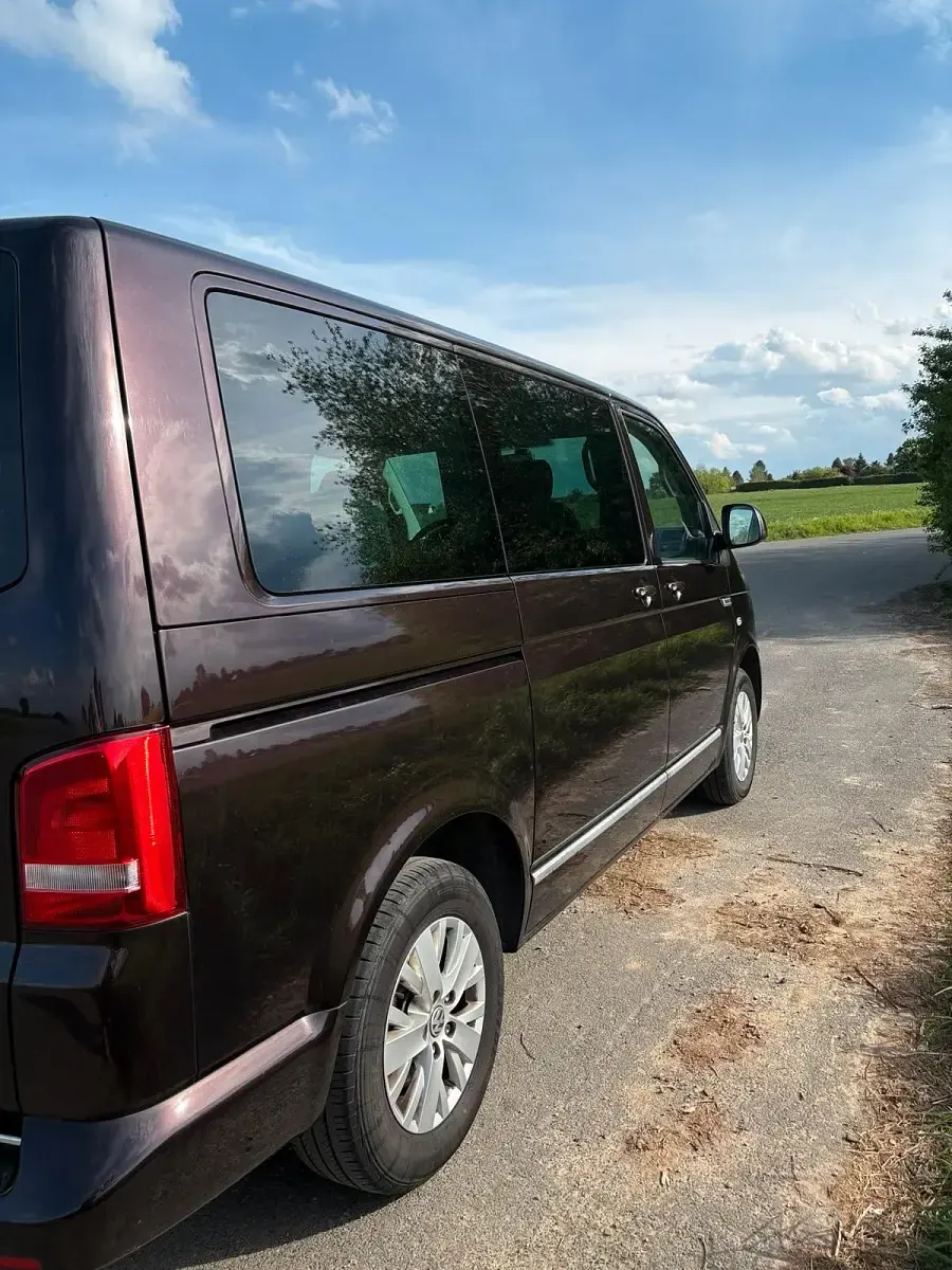 Używany VW Multivan 114 KM (83 kW) 2013 Purpurowy Minivan