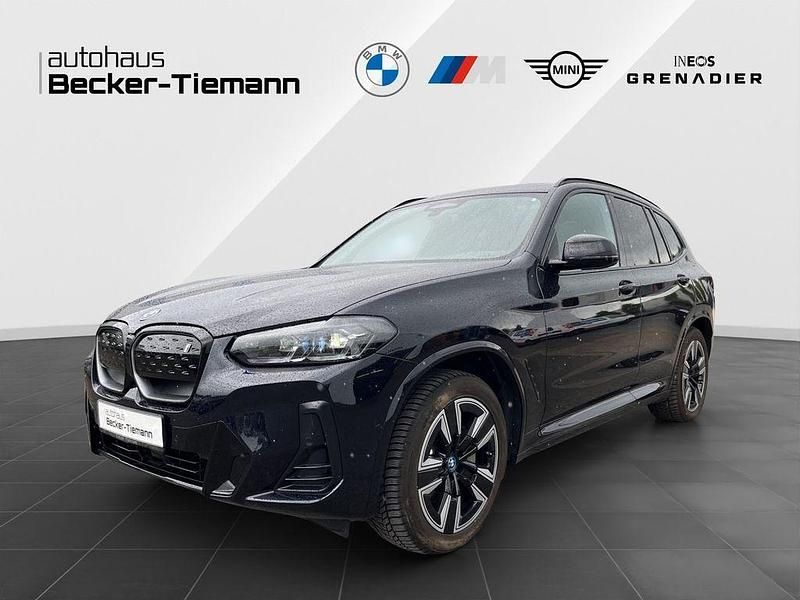 M carbonschwarz Gebraucht 2023 BMW iX3 Performance SUV | 44.809 € (Guter Preis) - Bild 1/4