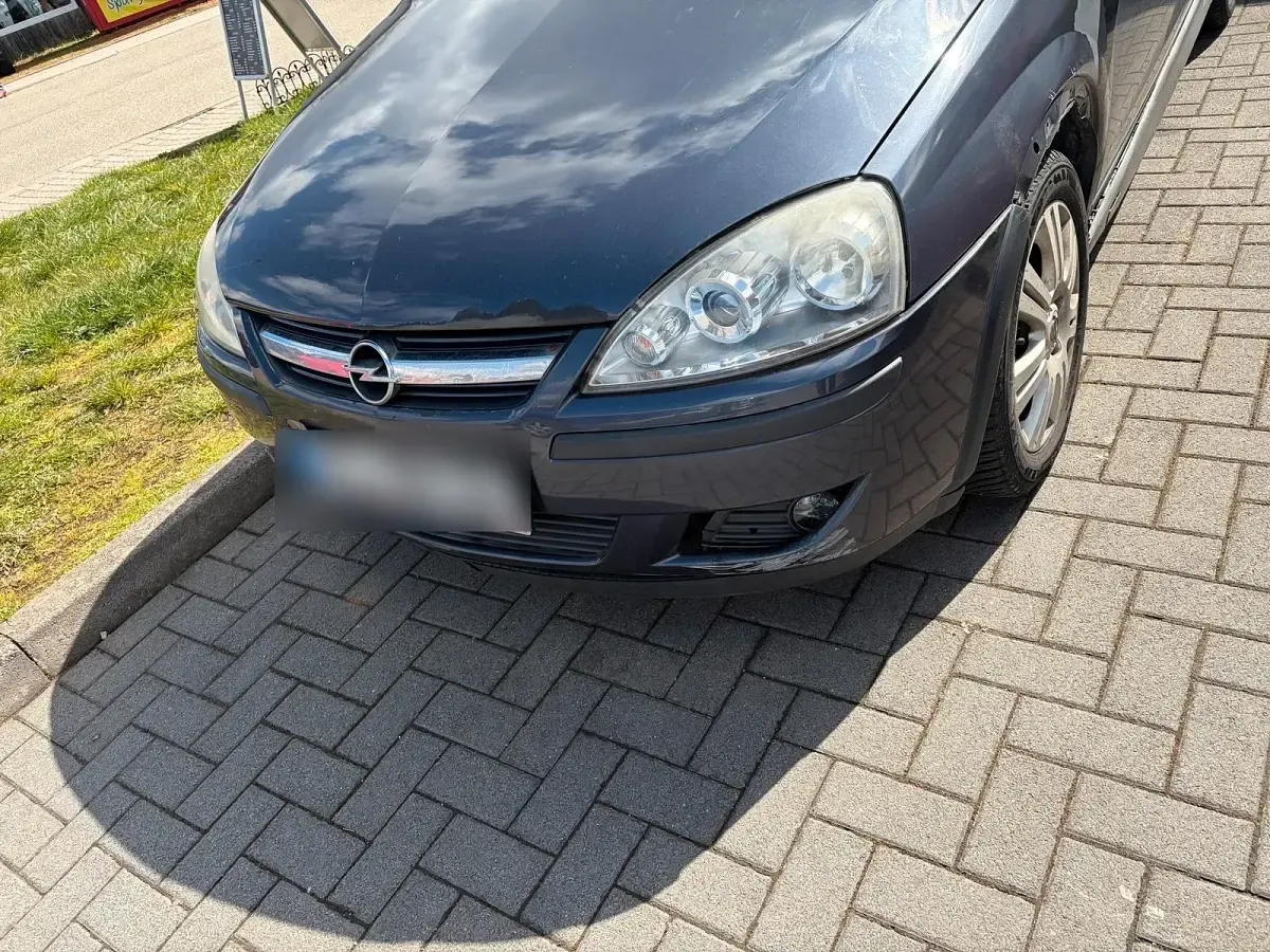 Używany Opel Corsa 76 KM (55 kW) 2006 Szary Hatchback