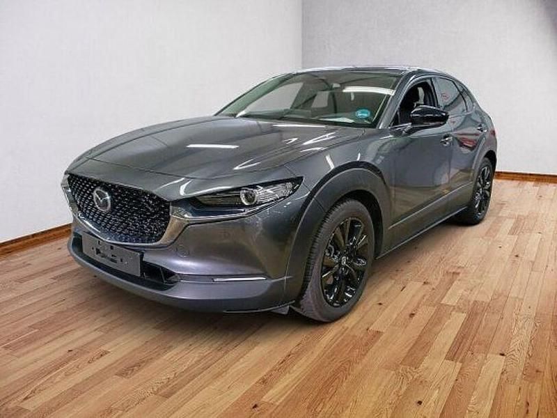 Machine gray (metallic) Gebraucht 2025 Mazda CX-30 Homura-Line SUV | 29.990 € (Fairer Preis) - Bild 1/4