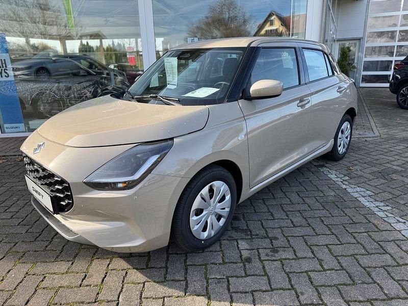 Beige Neu 2025 Suzuki Swift Club Limousine | 16.990 € - Bild 1/4