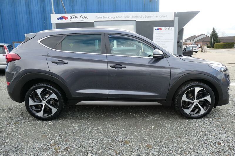Grau Gebraucht 2017 Hyundai Tucson Premium SUV | 17.990 € (Fairer Preis) - Bild 1/4