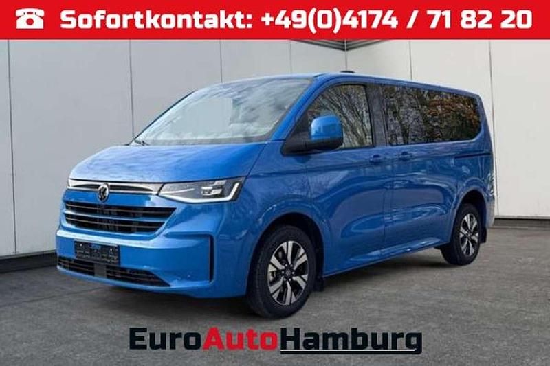 Mid blue metallic/blau Neu 2025 VW Caravelle Style Van / Kleinbus | 58.980 € (Guter Preis) - Bild 1/4