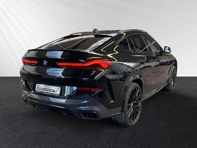 Gebraucht BMW X6 M50 M Sport 530 PS (389 kW) 2022 Saphirschwarz metallic SUV