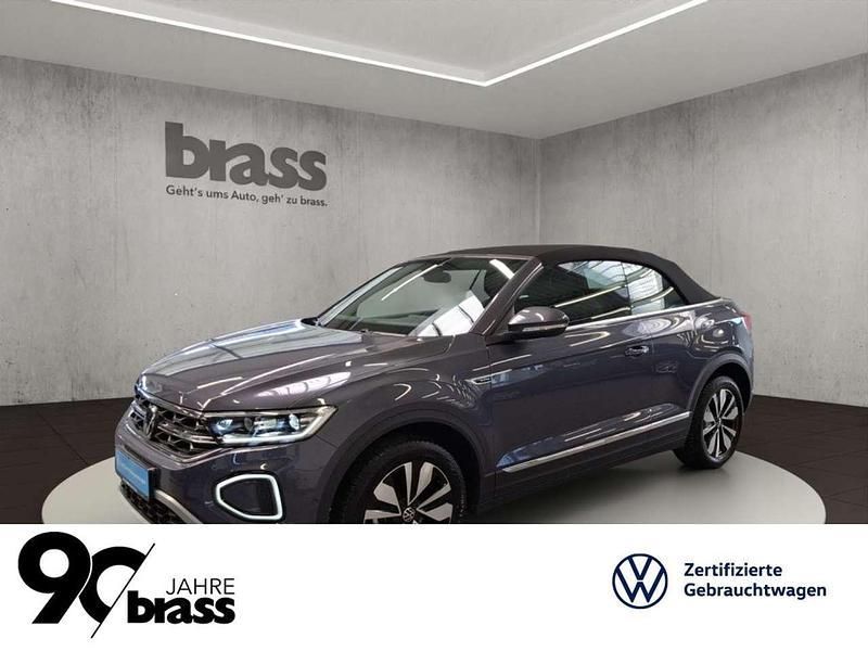 Rauchgrau metallic/schwarz Gebraucht 2024 VW T-Roc Cabriolet Move Cabrio | 32.600 € (Guter Preis) - Bild 1/4