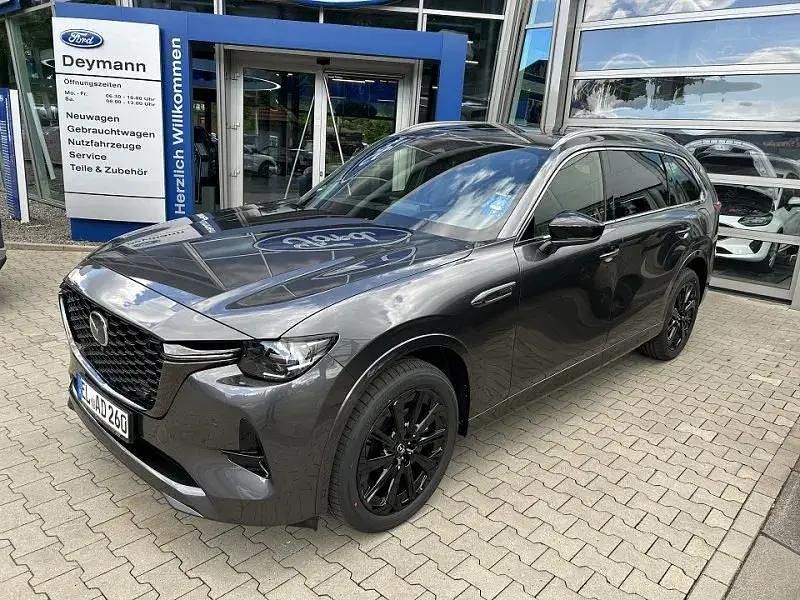Machine gray Gebraucht 2025 Mazda CX-80 Homura-Line SUV | 59.990 € (Fairer Preis) - Bild 1/4