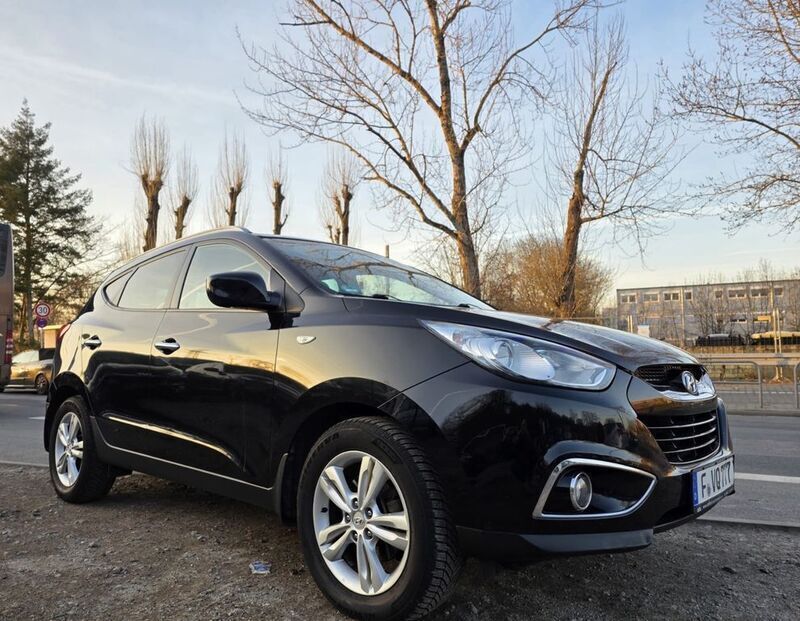 Schwarz Gebraucht 2012 Hyundai Tucson SUV | 7.490 € (Teuer) - Bild 1/4