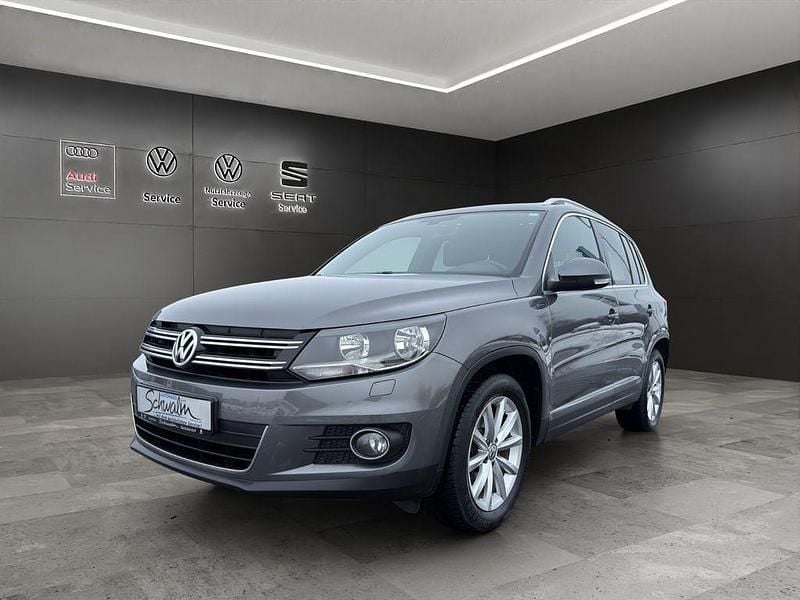 Grau Gebraucht 2015 VW Tiguan LOUNGE SUV | 12.990 € (Fairer Preis) - Bild 1/4