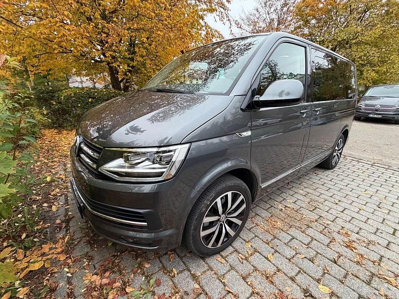 Grau Gebraucht 2016 VW Multivan Highline Van | 31.500 € (Superpreis) - Bild 1/4