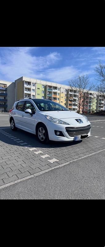 Gebraucht Peugeot 207 95 PS (69 kW) 2011 Weiß Kombi