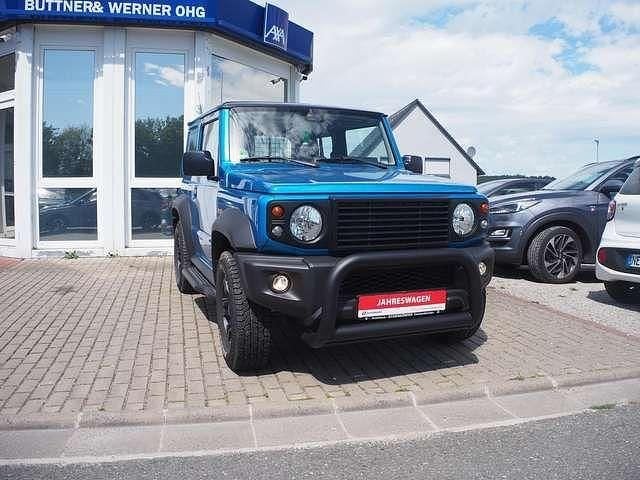 Kinetic yellow Gebraucht 2024 Suzuki Jimny SUV | 32.989 € (Superpreis) - Bild 1/4