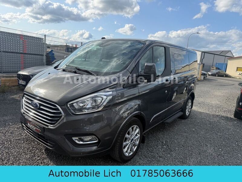 Grau Gebraucht 2023 Ford Tourneo Custom Van / Kleinbus | 25.199 € - Bild 1/4