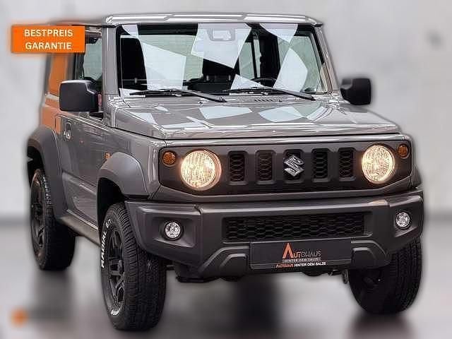 Grau Gebraucht 2024 Suzuki Jimny Comfort SUV | 32.970 € (Fairer Preis) - Bild 1/4
