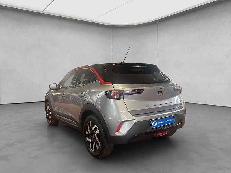 Gebraucht Opel Mokka-e 100 kW (136 PS) 2023 Kontrast grau metallic SUV