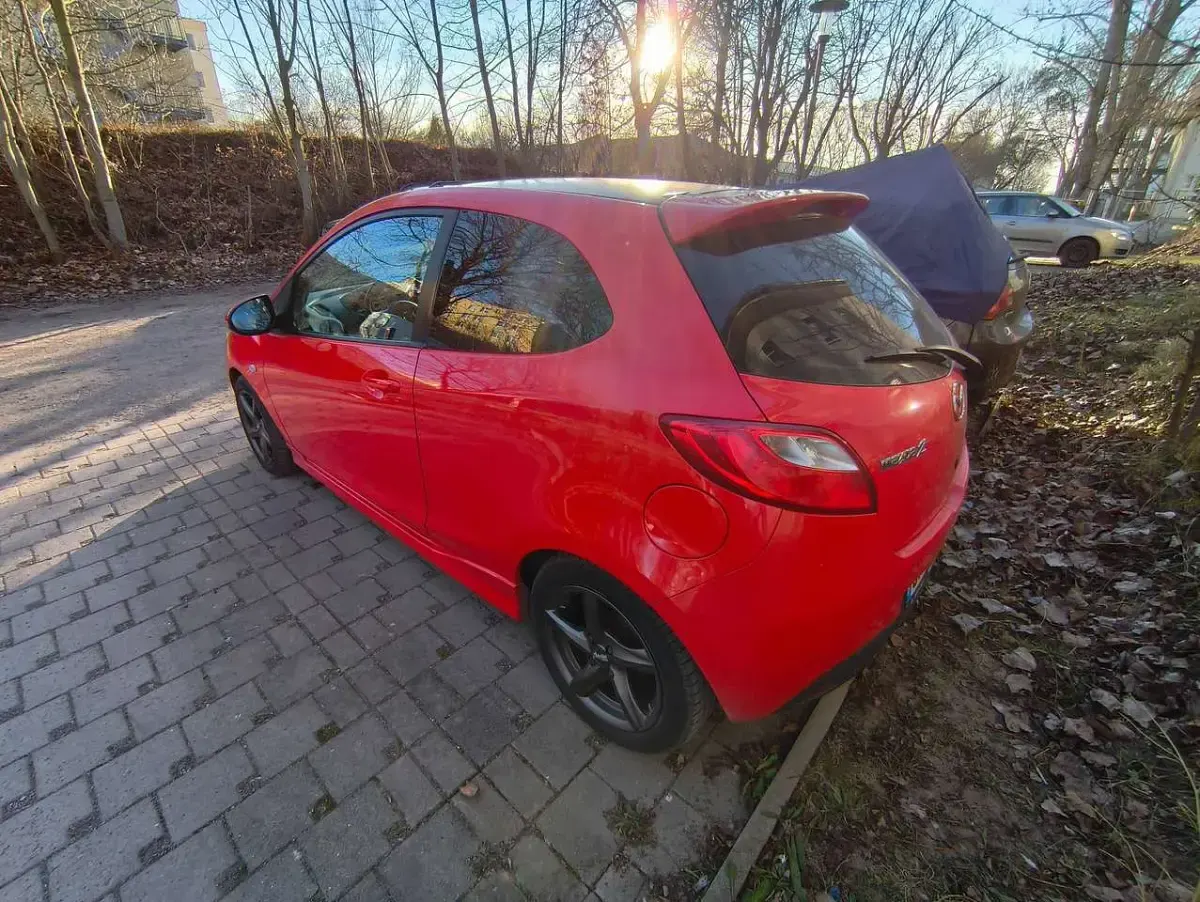 Gebraucht Mazda 2 Active 75 PS (55 kW) 2010 Rot Kleinwagen