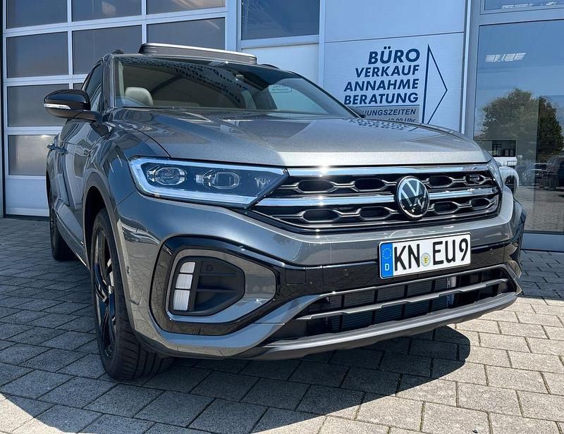 Indiumgrau Gebraucht 2025 VW T-Roc R-line SUV | 37.590 € (Fairer Preis) - Bild 1/4