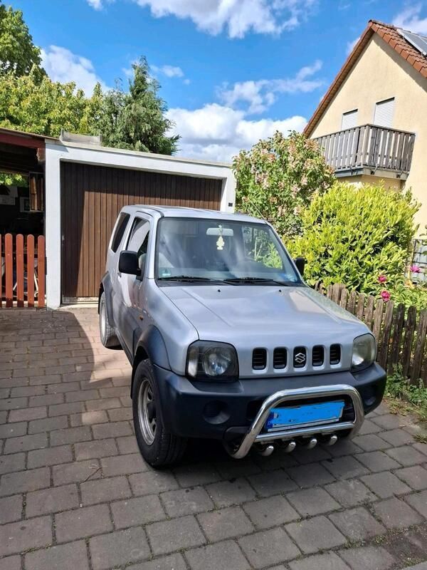 Grau Gebraucht 1999 Suzuki Jimny SUV | 1.500 € (Fairer Preis) - Bild 1/4