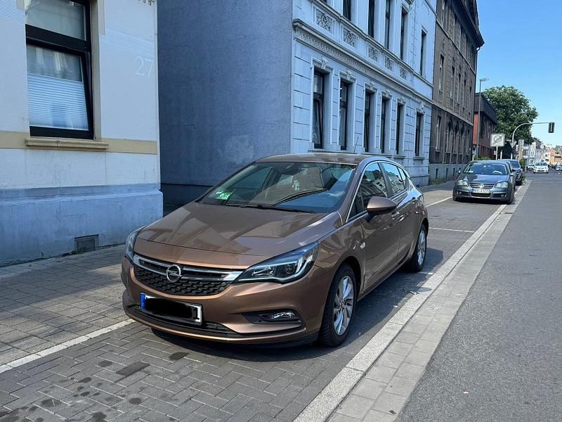 Braun Gebraucht 2016 Opel Astra Kleinwagen | 7.500 € (Fairer Preis) - Bild 1/4
