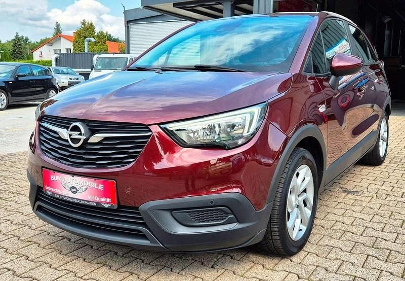 Rouge braun (metallic) Gebraucht 2018 Opel Crossland X SUV | 8.990 € (Superpreis) - Bild 1/4