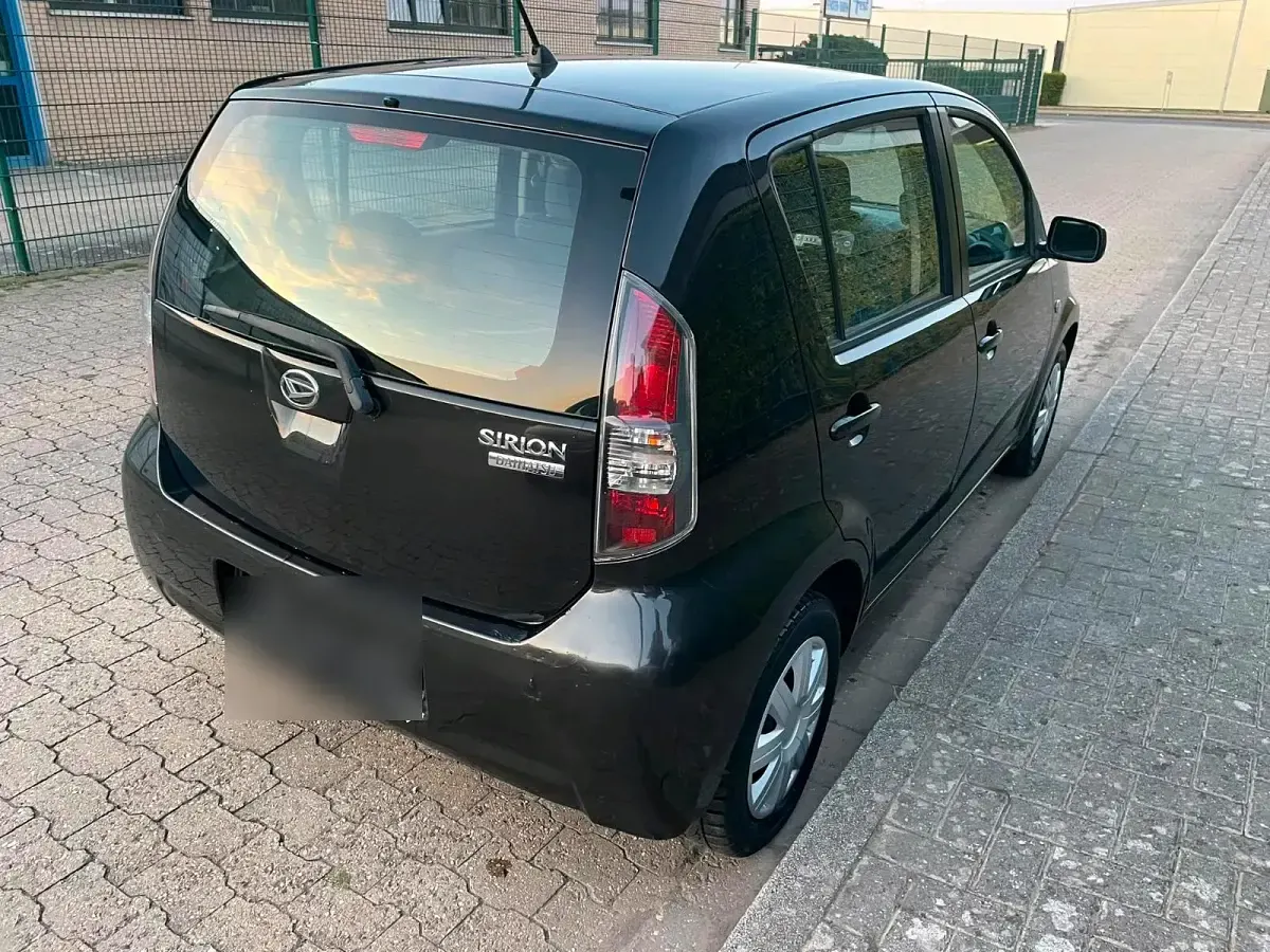 Gebraucht Daihatsu Sirion 70 PS (51 kW) 2010 Schwarz Kleinwagen