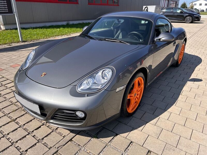 Meteorgraumetallic Gebraucht 2009 Porsche Cayman Coupé | 28.890 € (Fairer Preis) - Bild 1/4