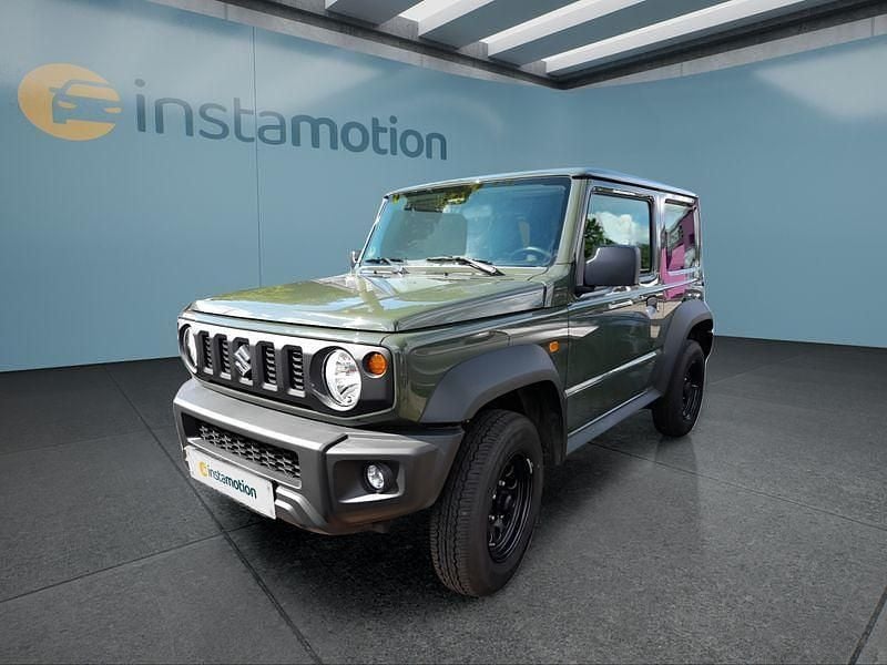 Grün Gebraucht 2023 Suzuki Jimny SUV | 29.799 € (Fairer Preis) - Bild 1/4