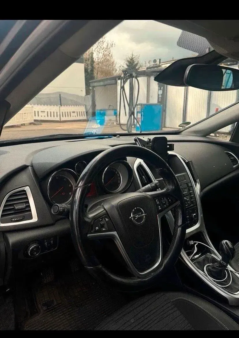 Gebraucht Opel Astra 125 PS (91 kW) 2012 Grün Limousine