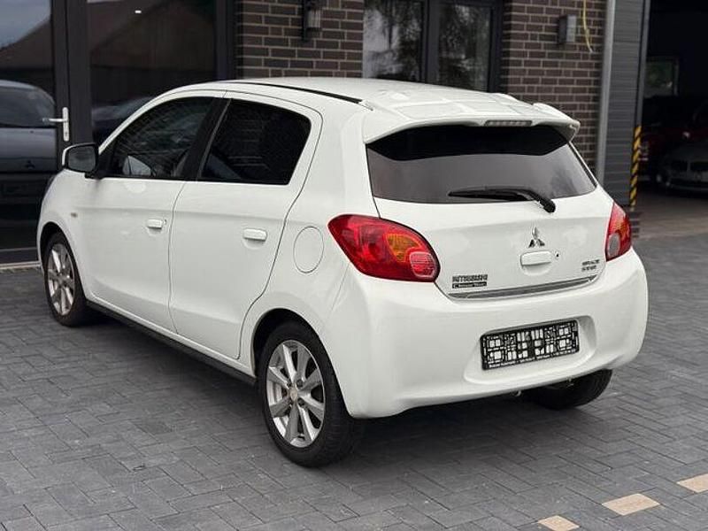 Gebraucht Mitsubishi Space Star 80 PS (58 kW) 2013 Weiß Kleinwagen
