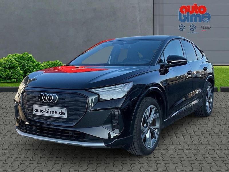 Mythosschwarz metallic Gebraucht 2021 Audi Q4 Sportback e-tron Sport SUV | 25.880 € (Fairer Preis) - Bild 1/4