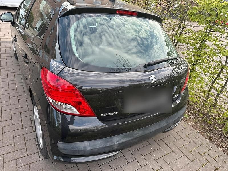 Gebraucht Peugeot 207 75 PS (55 kW) 2009 Schwarz Kleinwagen
