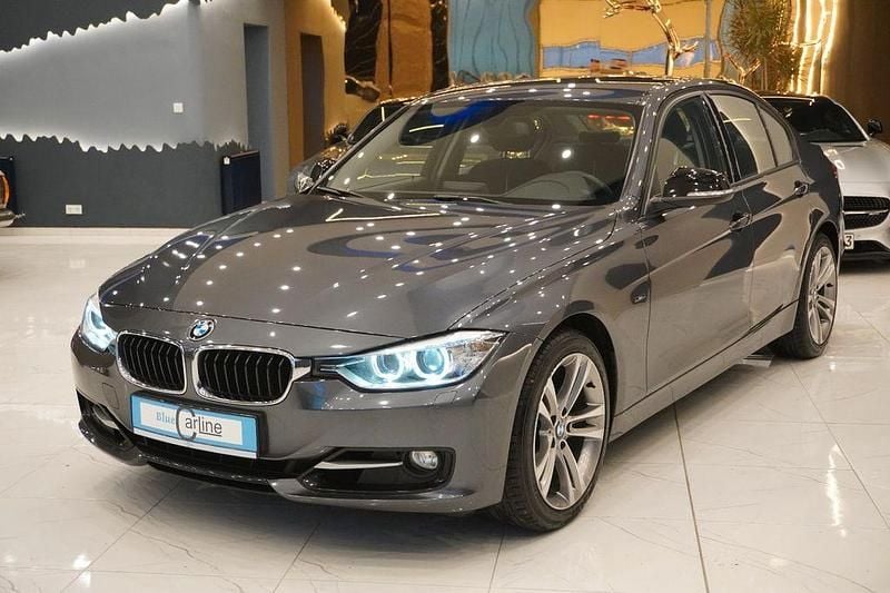 Grau Gebraucht 2014 BMW 320 Sport Line Limousine | 10.999 € (Superpreis) - Bild 1/4