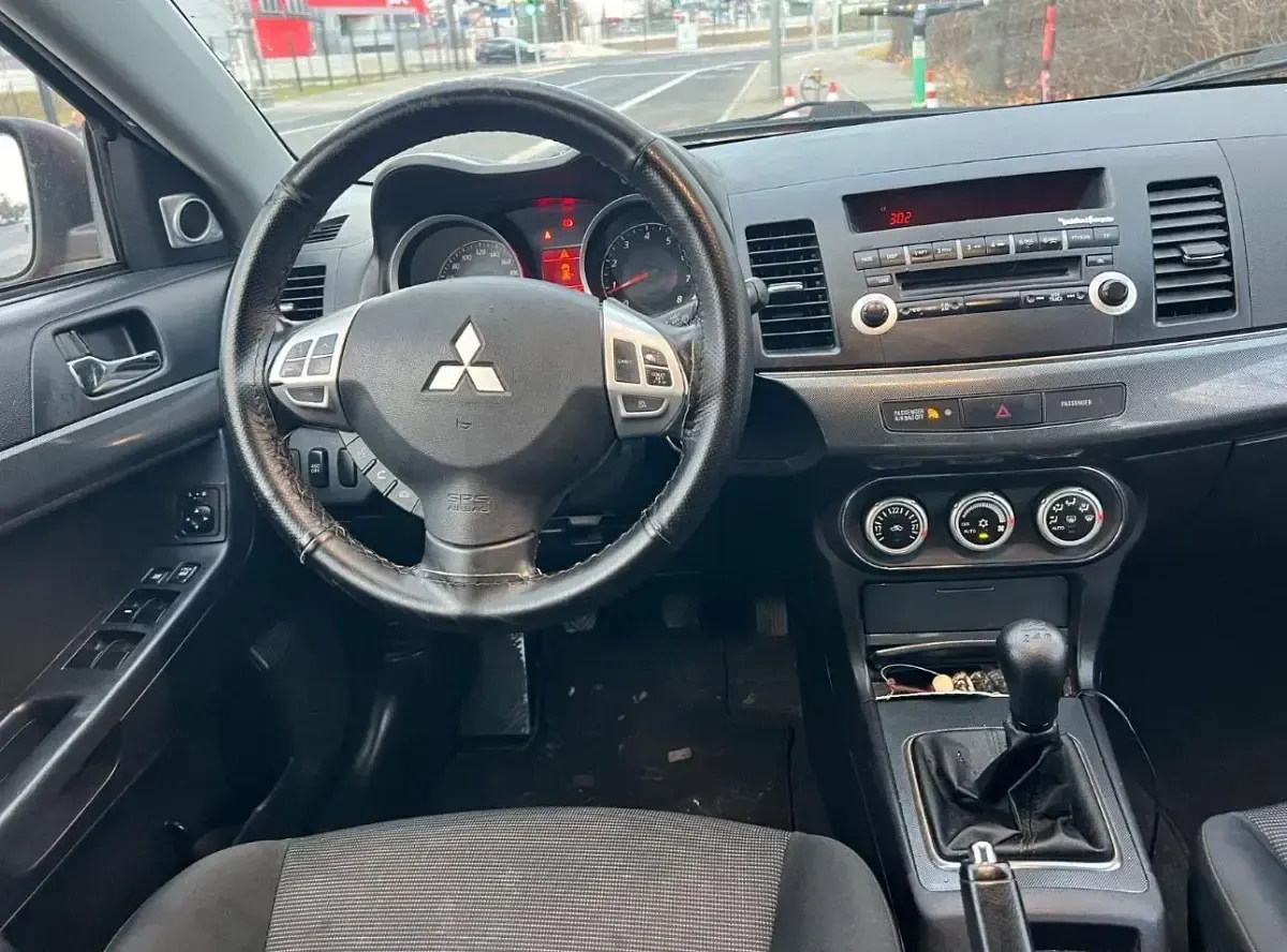 Gebraucht Mitsubishi Lancer 140 PS (102 kW) 2009 Rot Limousine