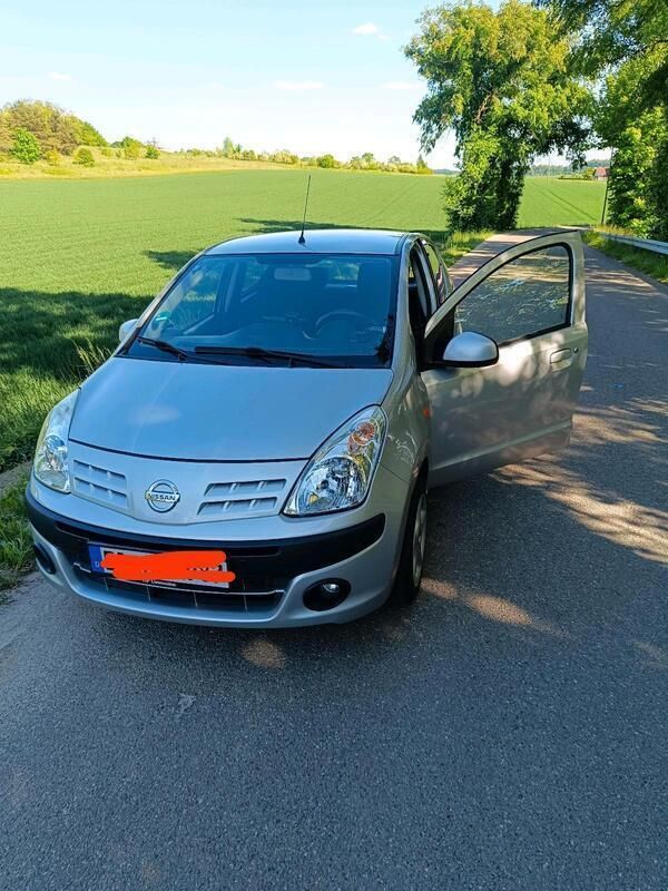 Silber Gebraucht 2009 Nissan Pixo Kleinwagen | 4.799 € - Bild 1/4