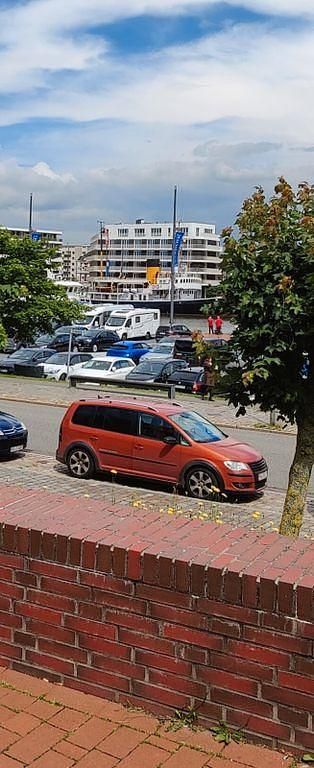 Orange Gebraucht 2007 VW Touran Cross Van / Kleinbus | 2.990 € (Fairer Preis) - Bild 1/4