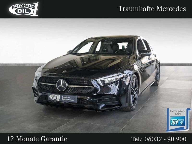 Schwarz (kosmosschwarz metalliclack) Gebraucht 2021 Mercedes A200 AMG line Limousine | 26.850 € (Fairer Preis) - Bild 1/3