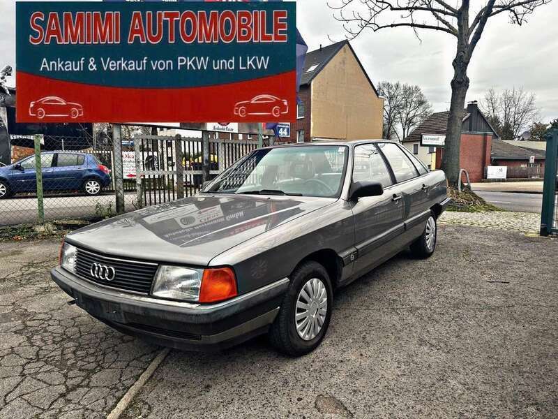 Grau Gebraucht 1986 Audi 100 Limousine | 7.999 € - Bild 1/4
