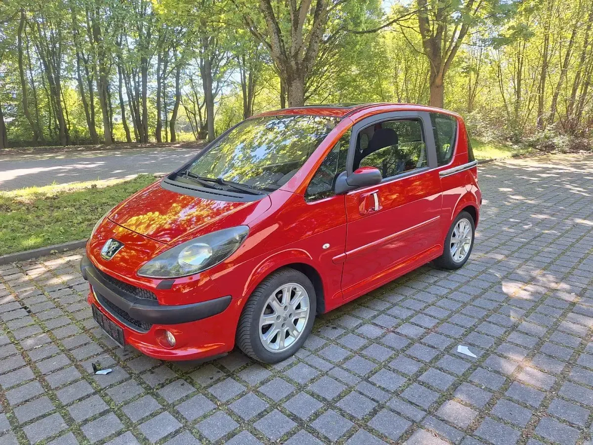 Gebraucht Peugeot 1007 108 PS (79 kW) 2006 Rot Van / Kleinbus