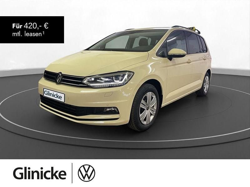 Hellelfenbein Gebraucht 2024 VW Touran Trendline Van / Kleinbus | 37.450 € (Teuer) - Bild 1/3