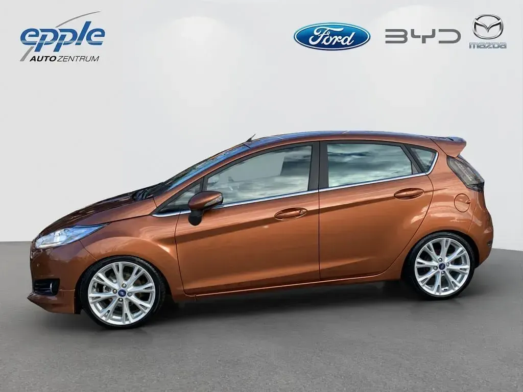 Gebraucht Ford Fiesta Individual 125 PS (91 kW) 2014 Castanobraun metallic Kleinwagen