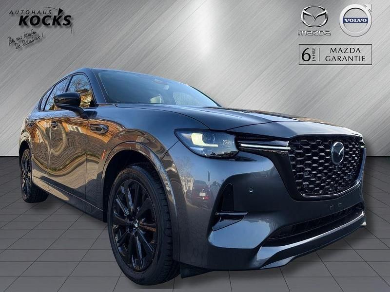 Machine gray Neu 2025 Mazda CX-60 Homura-Line SUV | 53.290 € (Etwas zu teuer) - Bild 1/4