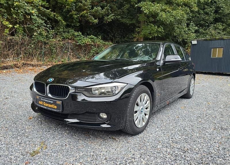 Schwarz Gebraucht 2014 BMW 318 Kombi | 9.999 € (Superpreis) - Bild 1/4