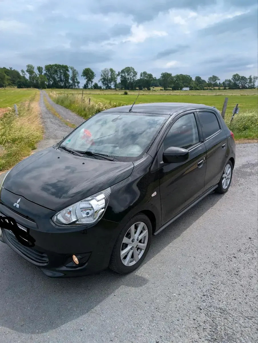 Gebraucht Mitsubishi Space Star 80 PS (58 kW) 2013 Schwarz Van / Kleinbus