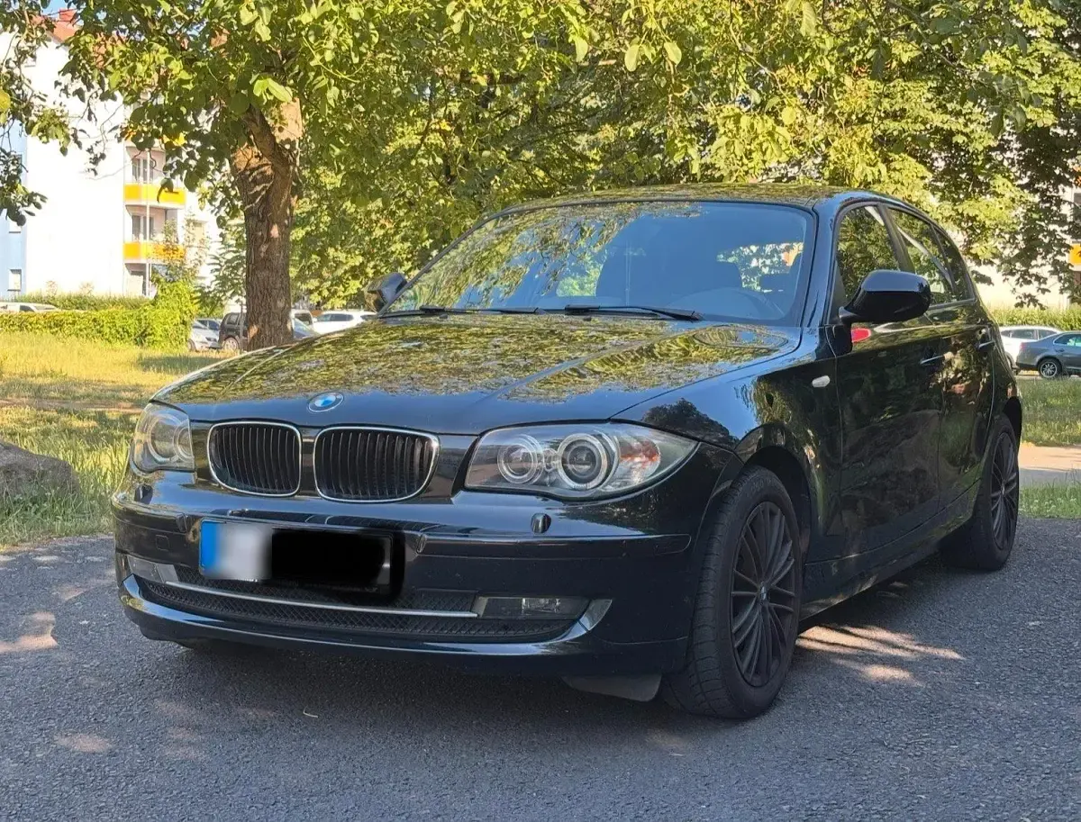 Używany BMW 116 122 KM (89 kW) 2010 Czarny Hatchback