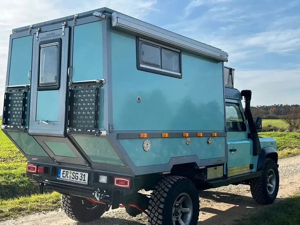 Gebraucht Land Rover Defender 128 PS (94 kW) 1996 Blau SUV