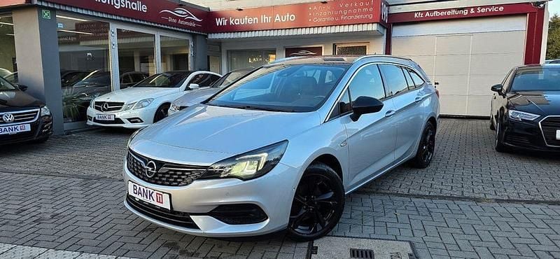 Silber Gebraucht 2021 Opel Astra Elegance Kombi | 12.999 € - Bild 1/4